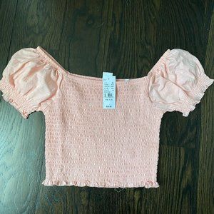 light pink tub top with ruffle sleaves